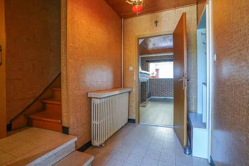 Te renoveren halfopen bebouwing Tisselt