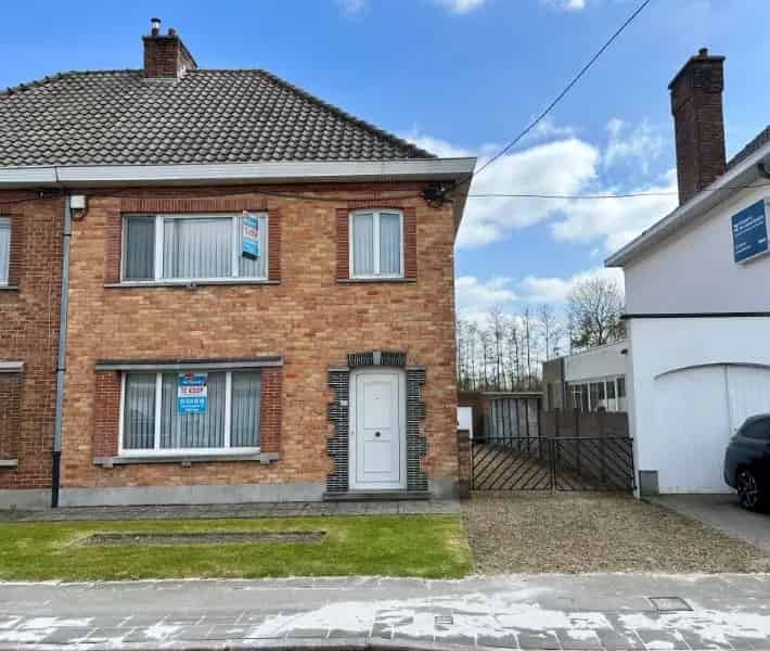 UITSTEKEND GELEGEN WONING MET GARAGE EN ZUIDTUIN