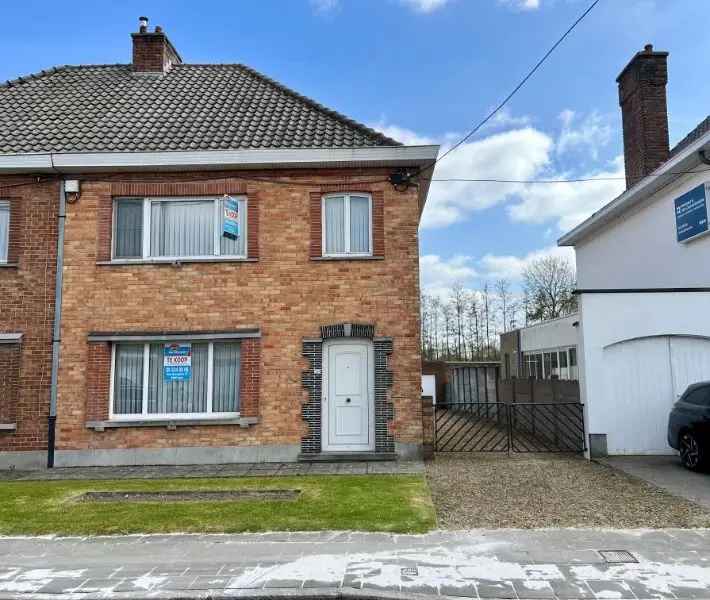 UITSTEKEND GELEGEN WONING MET GARAGE EN ZUIDTUIN