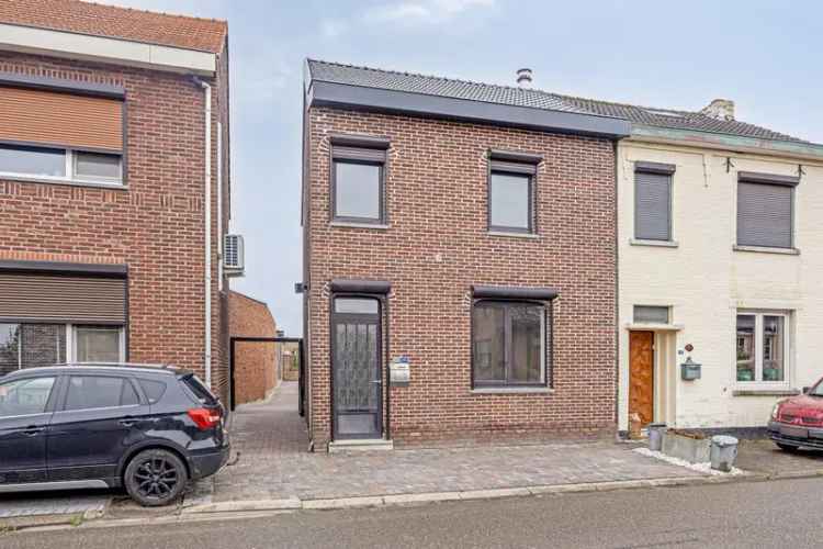 Huis te koop Lanaken: gerenoveerd met diepe tuin