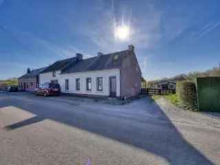 Huis te koop Rance met bijgebouwen en grond