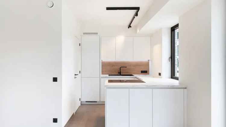 Nieuwbouwappartement Duinbergen: 2 slaapkamers, tuin, energiezuinig