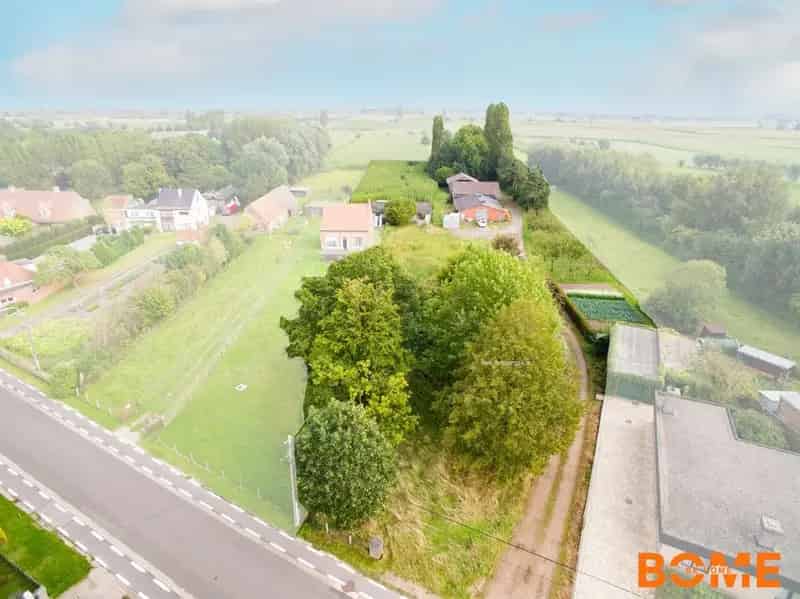 Grond te koop Waarschoot: Bouwgrond met Loodsen