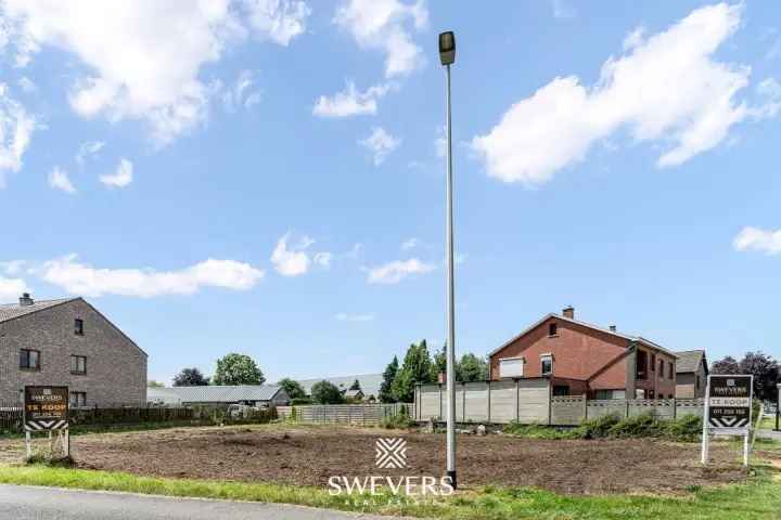 Zonovergoten bouwgrond van 8a 50ca voor open bebouwing in het centrum van Zonhoven