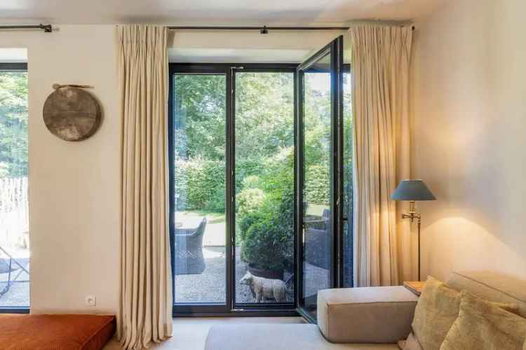 TE HUUR Luxe woning met grote parktuin