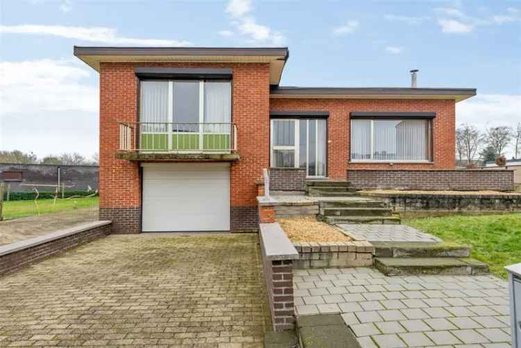 Te renoveren woning in Bekkevoort met veranda en garage