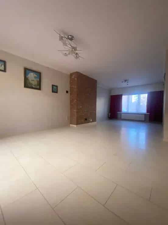 Huis Te Koop Niel: Rustige Woning met 3 slaapkamers en Garage