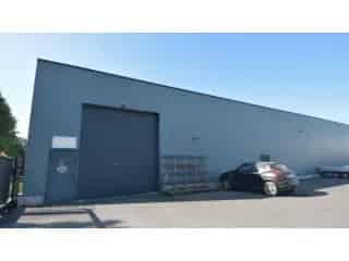 Handelspand te huur Sint Niklaas 322m² magazijn 208m² kantoor