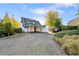 Huis te koop Assenede - Moderne Villa met Ruime Tuin en Bouwgrond