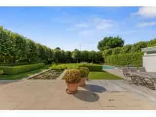 Huis te koop Bavikhove - Villa met praktijkruimte en zwembad