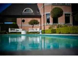 Huis te huur Wetteren Ruime woning grote tuin zwembad