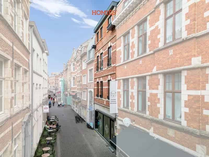 Opbrengsteigendom Leuven: 3 Appartementen & Handelszaak
