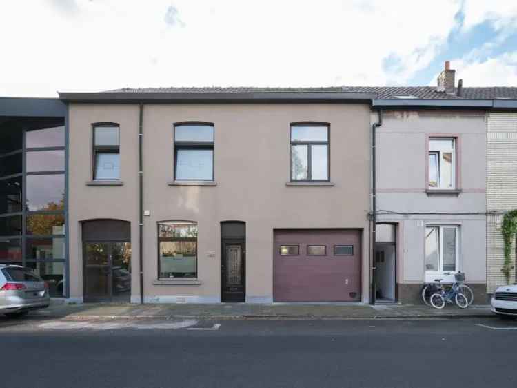 Woning met polyvalente mogelijkheden, zonnige tuin en inpandige garage op fietsafstand van het centrum van Gent.