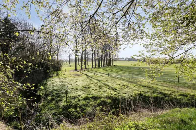Bouwgrond met Afgebrande Woning Te Koop