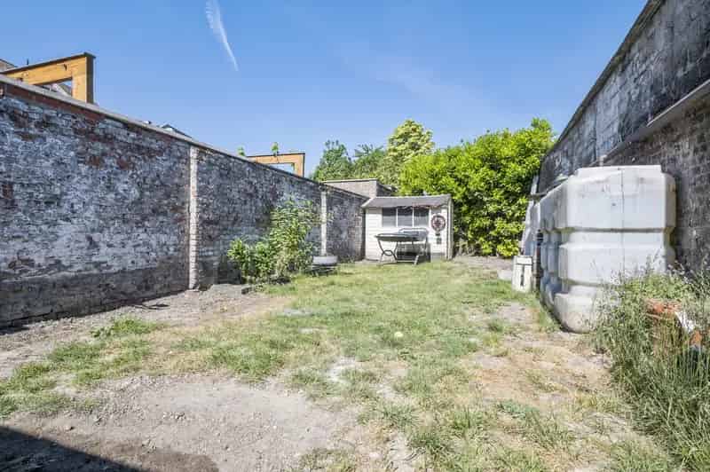 Te renoveren huis Gent met garage en tuin