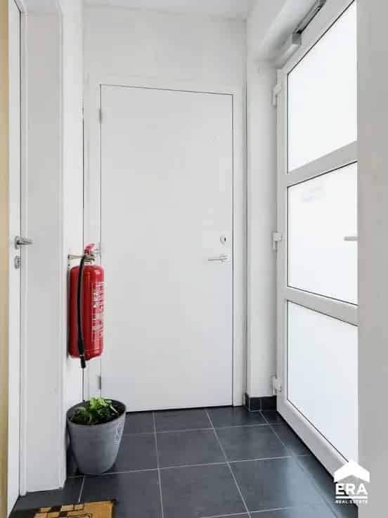 Handelspand met Duplexappartement te Koop Pelt
