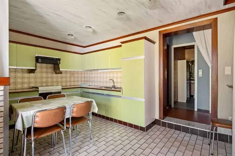 Bouwgrond met woning te renoveren in Putte