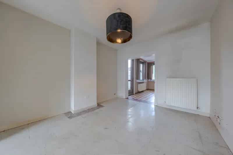 Huis te koop Mariekerke: 2 slaapkamers, tuin, achteruitweg
