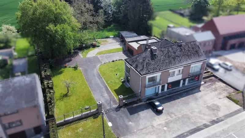 Renovatiepand Vloesberg: Woonst en Winkel