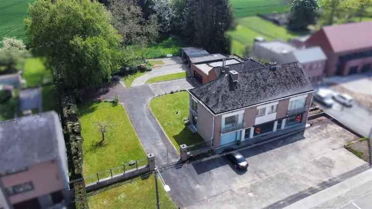 Renovatiepand Vloesberg: Woonst en Winkel