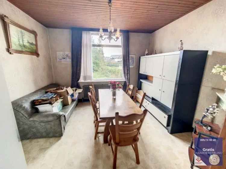 Te koop authentieke cité woning op perceel van 11a25ca