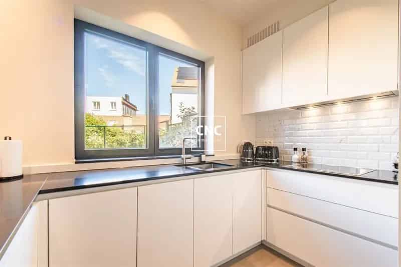 Appartement te huur Knokke: Stijlvol 2 slaapkamers met tuin