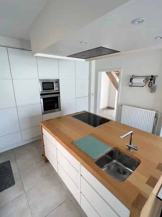 Huis Te Koop Kuurne: Instapklare Familiewoning met Garage en Tuin