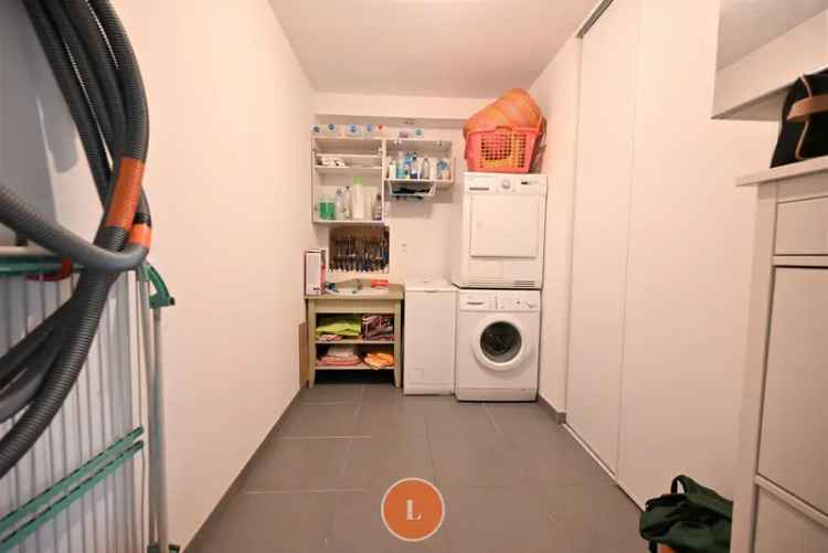 Recente rijwoning met grote garage en tuin in Menen