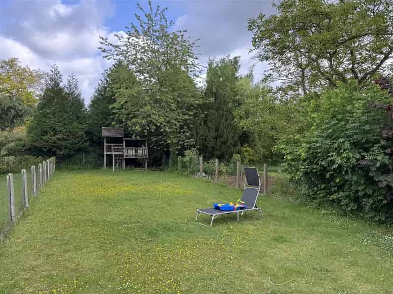 Huis te koop: Ruime halfopen bebouwing met tuin en garage