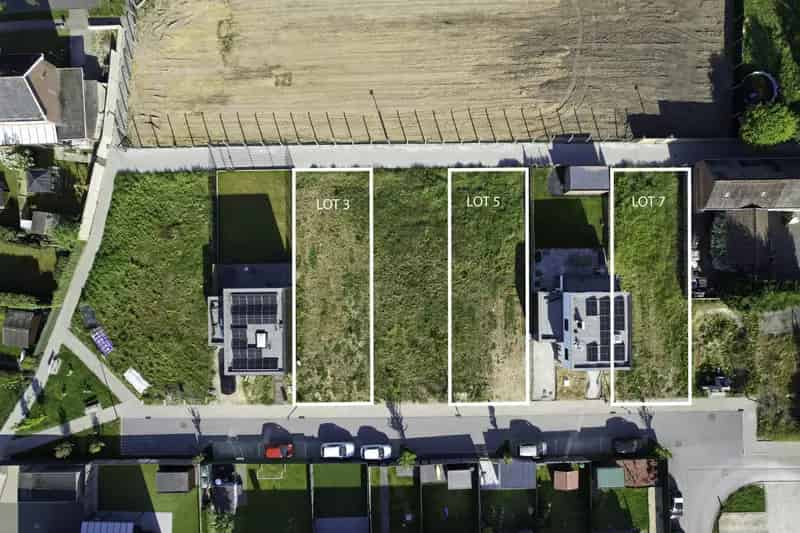 Bouwgrond Tisselt: Halfopen Bebouwing in Rustige Wijk