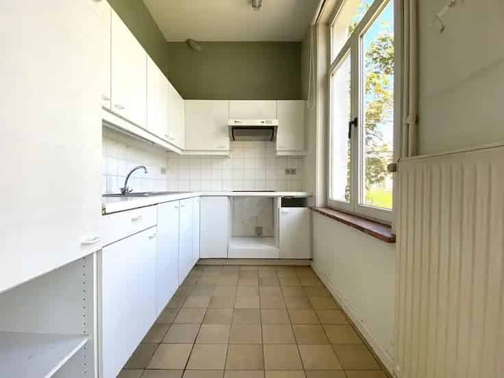 Huis Te Koop St-Michiels: Te Renoveren Woning met Tuin