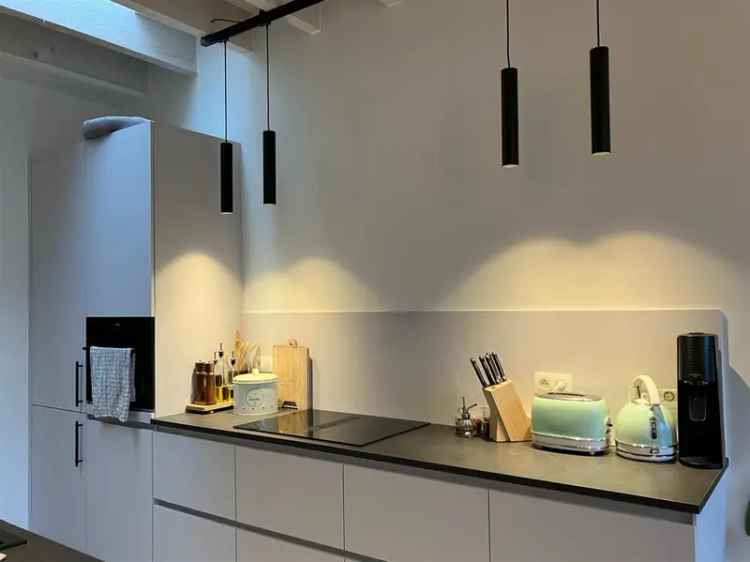 Modern en recente woning met 2 slaapkamers en tuin