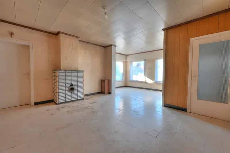 Huis te Koop Kaprijke: Halfopen Bebouwing met Grote Tuin