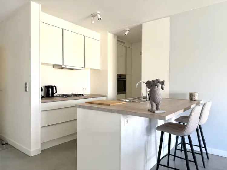 Gelijkvloers Appartement met Tuin en Garage te Huur