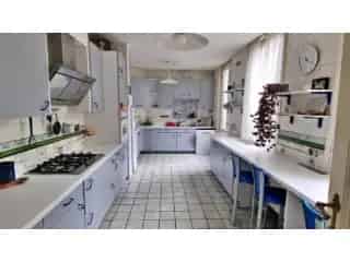Herenhuis te koop Luik 6 slaapkamers grote volumes
