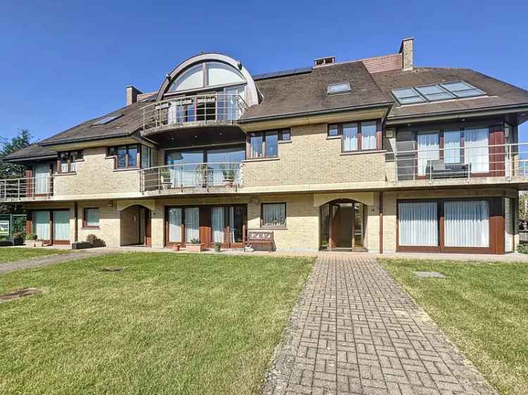 Appartement te huur Dilbeek: 2 slaapkamers, polyvalente ruimte en garage