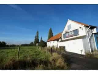 Bouwgrond Moeskroen Rekkem 10500m² Te renoveren hoeve