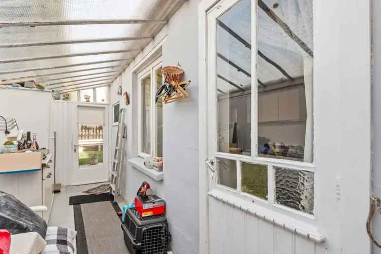Te renoveren eengezinswoning met tuin