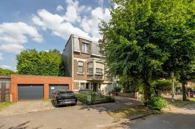 Rijwoning te renoveren Schoten tuin garage terras