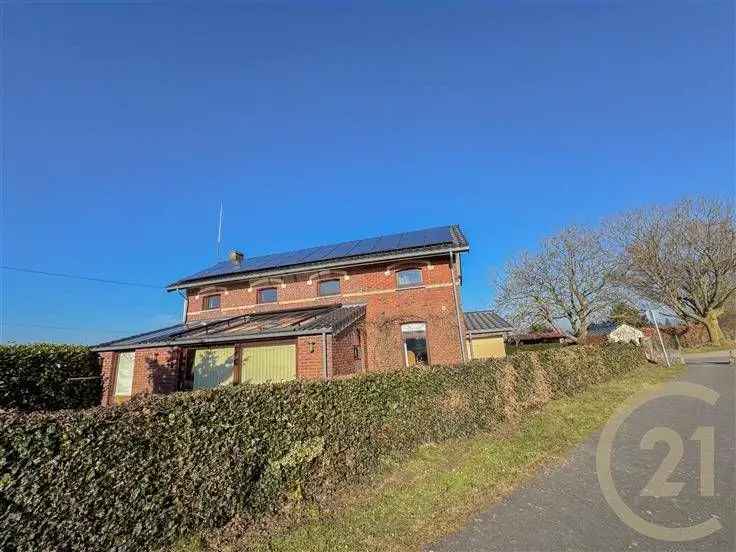 Te koop huis in Gembloux met grote tuin en unieke kenmerken