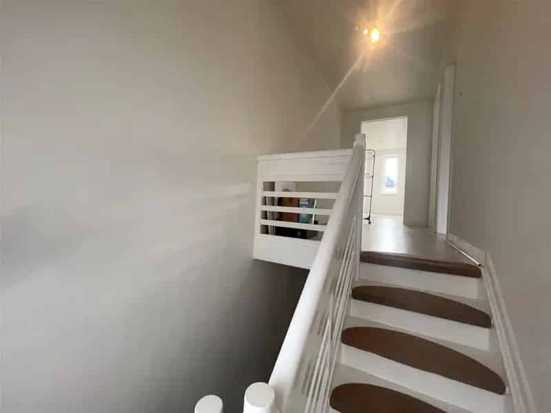 Huis te koop Niel: Woonst met Tuin en Winkelruimte