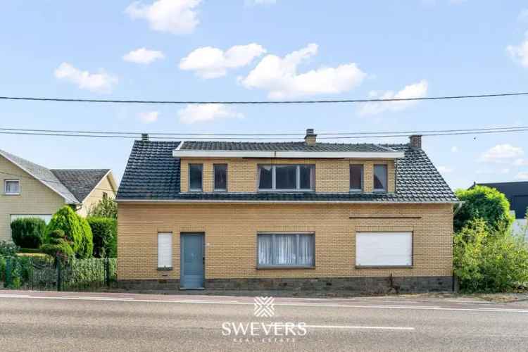 Te koop bouwperceel met te slopen woning in Borgloon