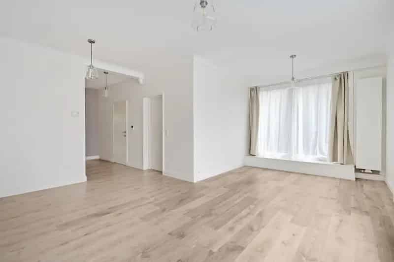 Gelijkvloers appartement 1 slaapkamer tuin garage te koop
