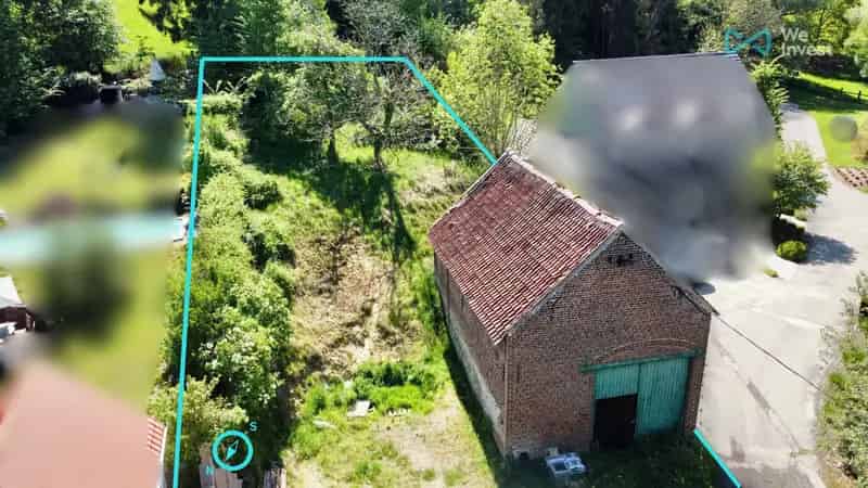 Bouwgrond met huis en schuur te Huldenberg