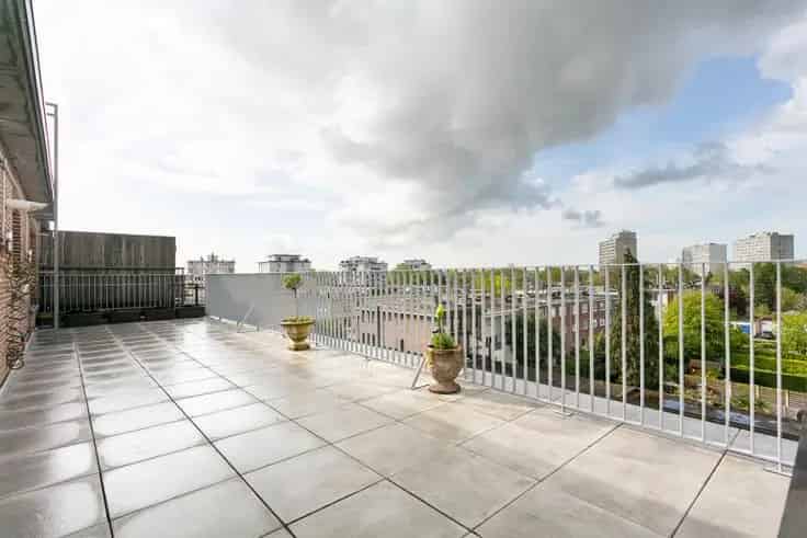 Dakappartement 2 slaapkamers Terras 50m2 Autostaanplaatsen
