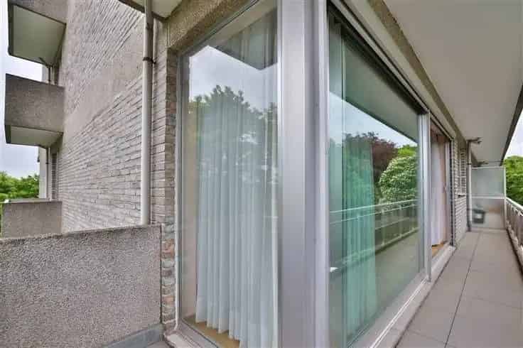 Ruim appartement 3 slaapkamers Mortsel met garage en parktuin