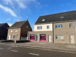 Handelspand te Koop Neeroeteren 506m² Magazijn Parking Instapklaar