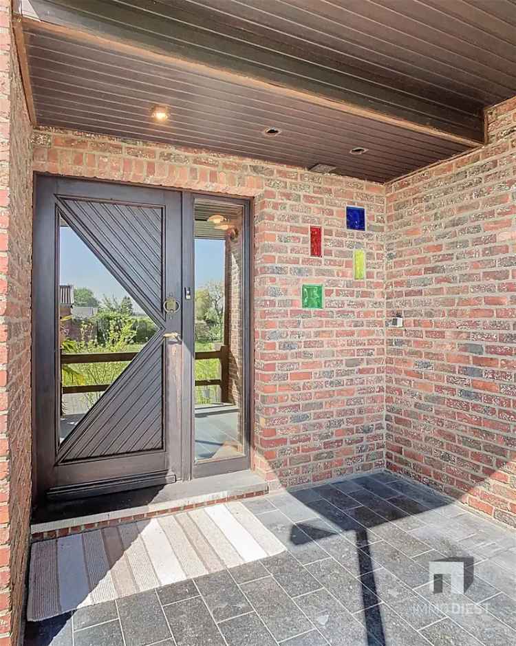 Ruime splitlevelwoning met tuin te koop