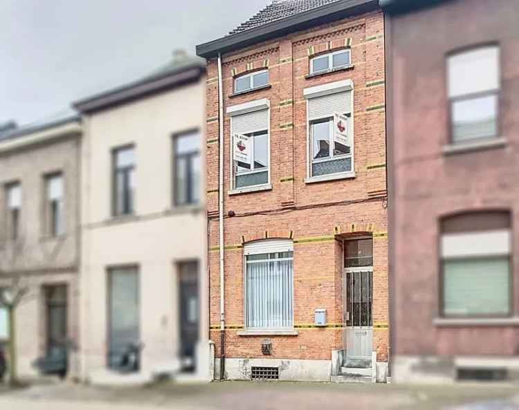 Centraal gelegen woning met charmante stadstuin én 4 SLPK!