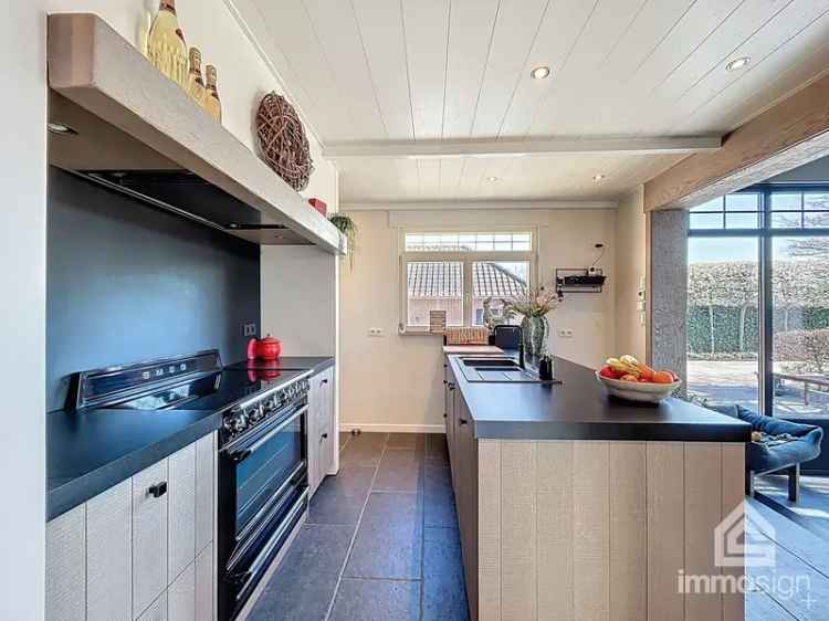 Exclusieve woning dubbele garage bedrijfshal Nederlandse grens